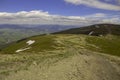 A large cloud shadow covers