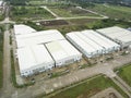 A large cluster of expansive warehouses on former farmland property. Industrial zone in Lipa, Batangas