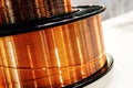 Large coil with copper wire. Production and sale of non-ferrous metal products. Close-up Royalty Free Stock Photo