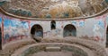 Large cold pool at the antique Roman baths, called frigidarium in the city of Pompei