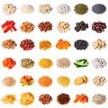 Large collection of different spices, herbs, nuts, dried fruits, beans, berries isolated on white background. Royalty Free Stock Photo