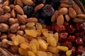 Large collection of nuts, seeds and dried fruits in brown wooden bowls Royalty Free Stock Photo