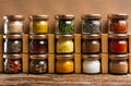 Large collection of spices in small jars Royalty Free Stock Photo