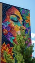 A large colorful mural on the side of a building with trees in front, AI Royalty Free Stock Photo