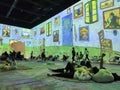 Large colorful projected display of Van Gogh arts on the wall in the Van Gogh Immersive Experience Exhibition