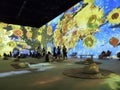 Large colorful projected display of Van Gogh arts on the wall in the Van Gogh Immersive Experience Exhibition