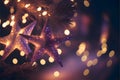 Large colorful stars on Christmas tree branches, bohek effect in the background, Christmas banner with space for your own content Royalty Free Stock Photo