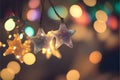 Large colorful stars on Christmas tree branches, bohek effect in the background, Christmas banner with space for your own content Royalty Free Stock Photo