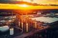 Large common area with petrochemical industry factory against background of dawn sky