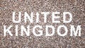 Large community of people forming the word UNITED KINGDOM. 3d illustration metaphor for culture, history and
