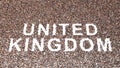 Large community of people forming the word UNITED KINGDOM. 3d illustration metaphor for culture, history