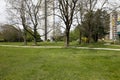 Large concrete buildings and trees and plants