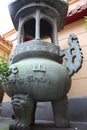 Large concrete Chinese vase or amphora. displayed outside a Chinese Buddhist temple in Amsterdam in Cinatown