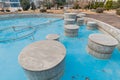 Concrete cylinders inside water fountain Royalty Free Stock Photo