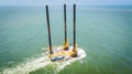 Large construction barge in a body of water. Texas coast, Port Aransas, Corpus Christi Channel