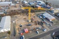 a large construction crane and various construction machines are used on a construction site Royalty Free Stock Photo