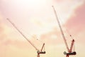 Large construction site including several cranes working on a building complex Royalty Free Stock Photo