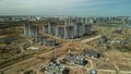 Large construction site. Construction of modern multi-storey residential buildings. Construction of apartment buildings from concr