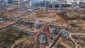 Large construction site. Construction of multi-storey buildings has begun. Tower cranes are standing. Aerial photography of Royalty Free Stock Photo