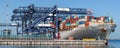 Large container cargo ship unloading Hayes Dock, Sydney Australia