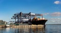 A large container cargo ship at Hayes Dock, Port Botany Royalty Free Stock Photo