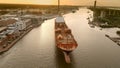 A large container ship leaves the port of Savannah after offloading its cargo Royalty Free Stock Photo