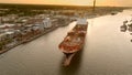 A large container ship leaves the port of Savannah after offloading its cargo Royalty Free Stock Photo