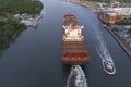 A large container ship leaves the port of Savannah after offloading its cargo Royalty Free Stock Photo