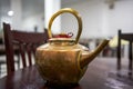 A large copper kettle used when adding water to copper pot shabu-shabu Royalty Free Stock Photo