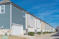 Large corner house and back alley of residential area line of two-car garage door near Dallas Royalty Free Stock Photo