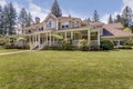 Large country home with wrap-around deck.