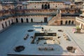 Large courtyard of the historical fort with tourists