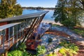 Large covered porch of luxury home with lake view. Royalty Free Stock Photo