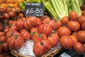 Large cow heart tomatoes for sale on farmers market stall