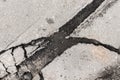 Large crack stratification separation of asphalt road broken damaged stone surface Royalty Free Stock Photo