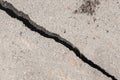 Large crack stratification separation of asphalt road broken damaged stone surface Royalty Free Stock Photo