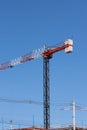 A Large crane being used for the construction of a new apartment building