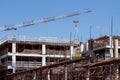 A Large crane being used for the construction of a new apartment building