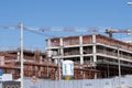 A Large crane being used for the construction of a new apartment building