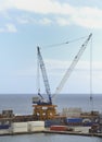 Large crane on the harbour wall of Ponta Delgrada