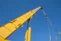 Large crane jib against blue sky background Royalty Free Stock Photo