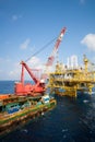 Large crane vessel installing the platform in offshore,crane barge doing marine heavy lift Royalty Free Stock Photo