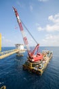 Large crane vessel installing the platform in offshore,crane barge doing marine heavy lift installation works Royalty Free Stock Photo