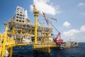 Large crane vessel installing the platform in offshore,crane barge doing marine heavy lift installation works in the gulf Royalty Free Stock Photo