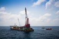 Large crane vessel installing the platform in offshore,crane barge doing marine heavy lift installation works in the gulf Royalty Free Stock Photo