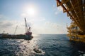 Large crane vessel installing the platform in offshore,crane barge doing marine heavy lift installation works in the gulf Royalty Free Stock Photo