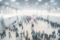 large crowd of anonymous blurred people at a trade fair Royalty Free Stock Photo