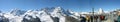 Large crowd in a mountain top cafe enjoying the view of the MATTERHORN