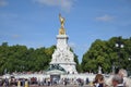 Large crowd of people gathered in front of the iconic Queen Victoria Memorial in London, England Royalty Free Stock Photo