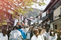 Large crowd scene at Matsubara Dori, popular shopping street on the way to famous Kiyomizu-dera temple in Kyoto, Japan